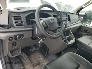 2023 Ford Transit Cargo with VIN 1FTBR1C83PKA24362, listed as a Copart auction lot 58766595 with 7,047 mi miles and Salvage title. Bid and sale history available at DreamBid. Image 8.
