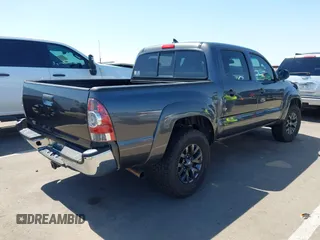 2015 Toyota Tacoma PreRunner with VIN 3TMJU4GNXFM191661, listed as a IAAI auction lot 42453516 with 145,898 mi miles and . Bid and sale history available at DreamBid. Image 4.