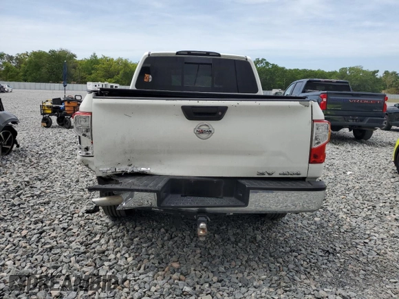 2017 Nissan Titan SV z VIN 1N6AA1EJ2HN570490, wystawiony jako Copart lot #50688785 z przebiegiem 122 817 mil mil oraz Szkoda całkowita • Salvage title. Historia ofert i sprzedaży dostępna na DreamBid. Obrazek 6.