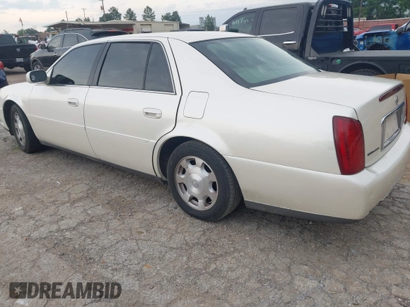 2002 Cadillac DeVille z VIN 1G6KD54Y92U130111, wystawiony jako IAAI lot #42439252 z przebiegiem 194 669 mil mil oraz . Historia ofert i sprzedaży dostępna na DreamBid. Obrazek 3.
