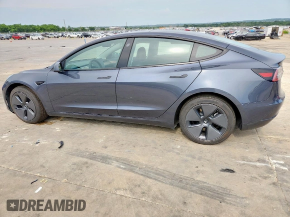 2023 Tesla Model 3 with VIN 5YJ3E1EA1PF468627, listed as a Copart auction lot 57285575 with 5,952 mi miles and Salvage title. Bid and sale history available at DreamBid. Image 2.