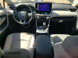 2023 Toyota RAV4 Hybrid XLE Premium с VIN JTMB6RFV0PD084497, выставлен на аукционе Copart как лот 64655015 с пробегом 23 481 миль миль и Списание • Salvage title. История ставок и продаж доступна на DreamBid. Изображение 8.