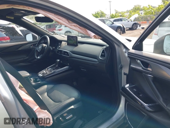 2020 Mazda CX-9 Grand Touring with VIN JM3TCBDY6L0424584, listed as a IAAI auction lot 42473920 with 32,385 mi miles and . Bid and sale history available at DreamBid. Image 5.