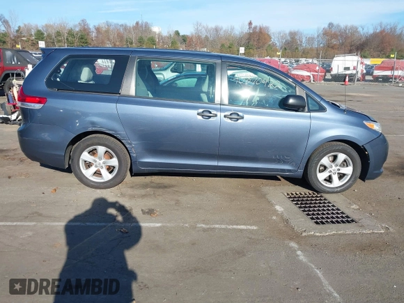 2014 Toyota Sienna L with VIN 5TDZK3DC0ES413970, listed as a IAAI auction lot 40870422 with 138,589 mi miles. Bid and sale history available at carsss.com. Image 13.