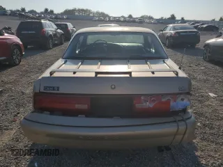 1995 Buick Regal Custom с VIN 2G4WB12L5S1470027, выставлен на аукционе Copart как лот 68827734 с пробегом 89 016 миль миль и Списание • Salvage title. История ставок и продаж доступна на DreamBid. Изображение 6.