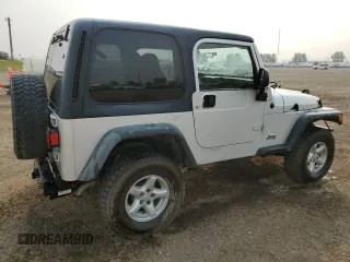 2003 Jeep Wrangler Sport z VIN 1J4FA49S93P306817, wystawiony jako Copart lot #60136385 z przebiegiem 217 208 mil mil oraz Czysty tytuł • Clean title. Historia ofert i sprzedaży dostępna na DreamBid. Obrazek 3.