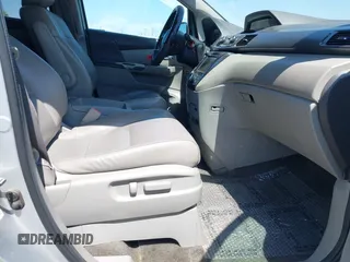 2014 Honda Odyssey Touring with VIN 5FNRL5H91EB068427, listed as a IAAI auction lot 42163315 with 184,134 mi miles and . Bid and sale history available at DreamBid. Image 5.