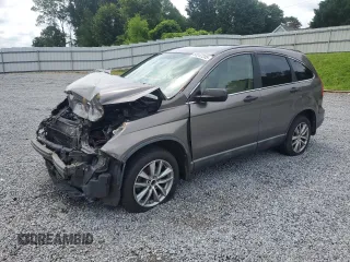 2010 Honda CR-V LX with VIN 5J6RE4H34AL015769, listed as a Copart auction lot 60247205 with 134,590 mi miles and Salvage title. Bid and sale history available at DreamBid. Image 1.