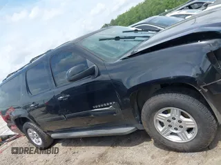 2010 Chevrolet Suburban LT with VIN 1GNUCJE06AR138587, listed as a IAAI auction lot 42145484 with 283,318 mi miles and . Bid and sale history available at DreamBid. Image 12.