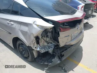 2021 Toyota Prius LE with VIN JTDKAMFP5M3167430, listed as a IAAI auction lot 42462853 with 70,492 mi miles and . Bid and sale history available at DreamBid. Image 12.