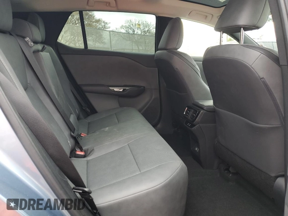 2023 Lexus RZ 450e Premium z VIN JTJAAAAB6PA009956, wystawiony jako Copart lot #48707855 z przebiegiem 6736 mil mil oraz Szkody całkowita. Historia ofert i sprzedaży dostępna na DreamBid. Obrazek 12.