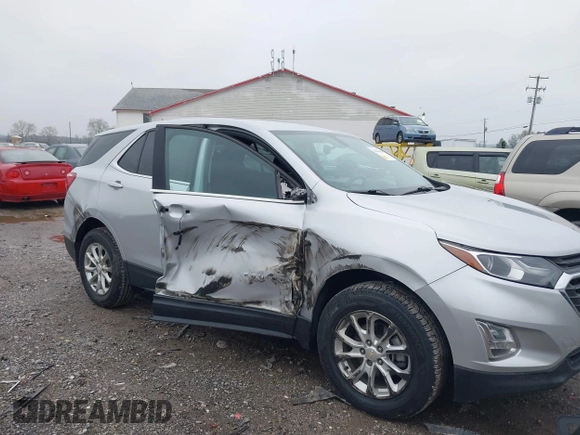 2018 Chevrolet Equinox LT with VIN 2GNAXSEV0J6118016, listed as a IAAI auction lot 42010356 with 95,254 mi miles and . Bid and sale history available at DreamBid. Image 6.