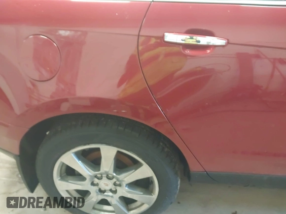 2012 Cadillac SRX Performance Collection with VIN 3GYFNEE36CS657582, listed as a IAAI auction lot 42084319 with 171,335 mi miles. Bid and sale history available at carsss.com. Image 6.