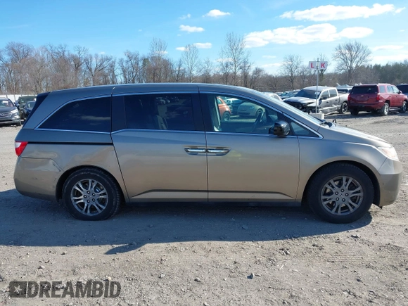 2012 Honda Odyssey EX-L with VIN 5FNRL5H63CB016526, listed as a IAAI auction lot 41701396 with 132,016 mi miles and . Bid and sale history available at carsss.com. Image 14.
