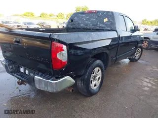 2014 Toyota Tundra 4WD Truck SR with VIN 5TFUW5F1XEX377799, listed as a IAAI auction lot 41889381 with 225,551 mi miles. Bid and sale history available at carsss.com. Image 4.