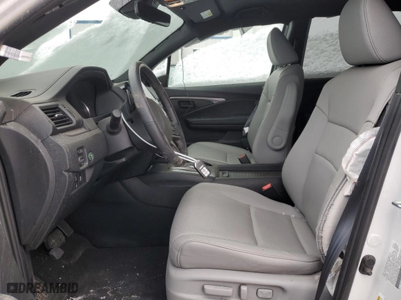 2023 Honda Passport EX-L with VIN 5FNYF8H58PB044081, listed as a Copart auction lot 71631594 with 5,981 mi miles and Salvage Title. Bid and sale history available at carsss.com. Image 7.