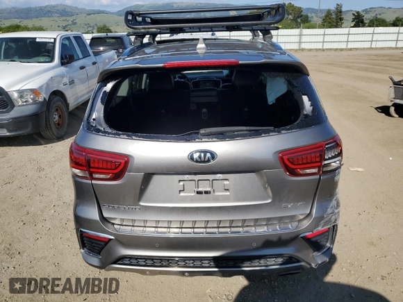 2019 Kia Sorento SX z VIN 5XYPK4A56KG528438, wystawiony jako Copart lot #55158685 z przebiegiem 86 288 mil mil oraz Szkoda całkowita • Salvage title. Historia ofert i sprzedaży dostępna na DreamBid. Obrazek 6.