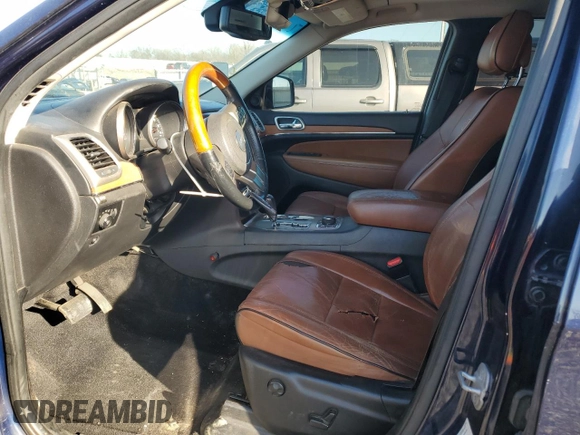 2013 Jeep Grand Cherokee Overland with VIN 1C4RJFCT8DC523252, listed as a Copart auction lot 48706965 with 173,325 mi miles and Salvage Title. Bid and sale history available at carsss.com. Image 7.