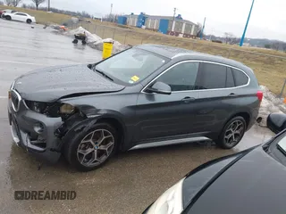 2019 BMW X1 sDrive28i with VIN WBXHU7C52K5L12160, listed as a IAAI auction lot 41452244 with 59,344 mi miles and . Bid and sale history available at DreamBid. Image 15.