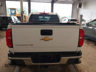 2020 Chevrolet Colorado 4WD Work Truck with VIN 1GCGTBEN8L1156811, listed as a IAAI auction lot 42273222 with 65,617 mi miles and . Bid and sale history available at DreamBid. Image 16.