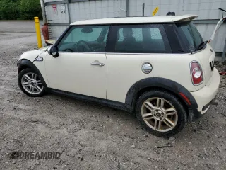 2011 MINI Hardtop S with VIN WMWSV3C56BTY15420, listed as a Copart auction lot 58050875 with 162,145 mi miles and Salvage title. Bid and sale history available at DreamBid. Image 2.