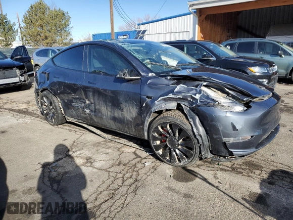 2022 Tesla Model Y Performance with VIN 7SAYGDEF0NF452111, listed as a Copart auction lot 47595975 with 33,514 mi miles and Salvage Title. Bid and sale history available at DreamBid. Image 4.