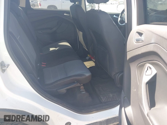 2014 Ford Escape SE with VIN 1FMCU9GX0EUC76506, listed as a IAAI auction lot 42131024 with 117,897 mi miles and . Bid and sale history available at carsss.com. Image 8.