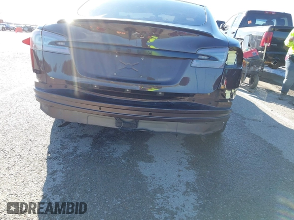 2014 Tesla Model S 60 with VIN 5YJSA1H17EFP33275, listed as a IAAI auction lot 41778167 with 202,749 mi miles and . Bid and sale history available at DreamBid. Image 6.