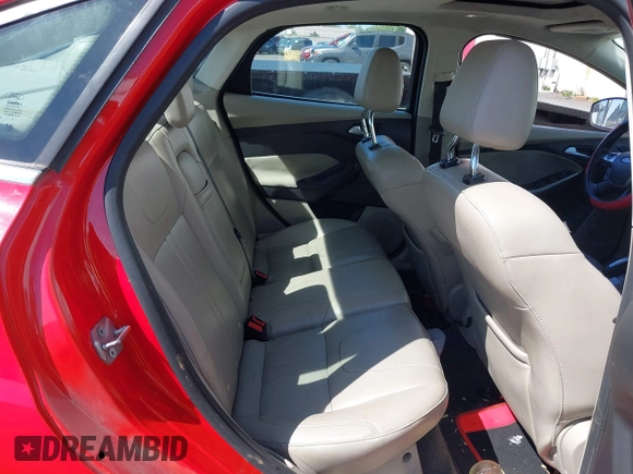 2012 Ford Focus SEL with VIN 1FAHP3H23CL291253, listed as a IAAI auction lot 42044902 with 184,716 mi miles. Bid and sale history available at carsss.com. Image 8.