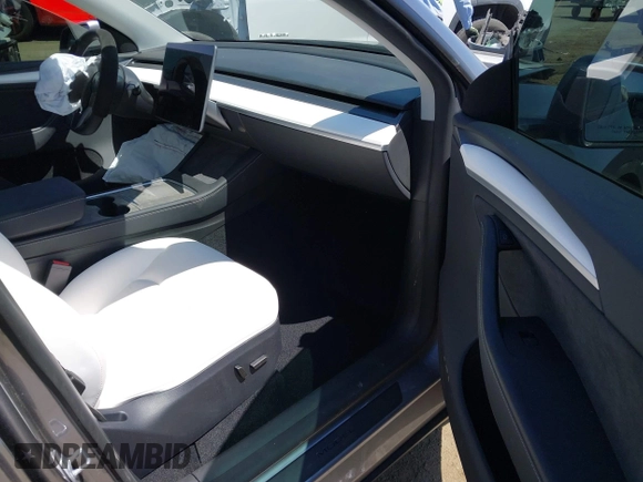 2024 Tesla Model Y Performance with VIN 7SAYGDEF9RA299036, listed as a IAAI auction lot 42140788 with 14,844 mi miles and . Bid and sale history available at DreamBid. Image 5.
