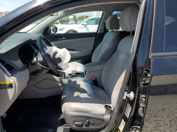 2017 Hyundai Tucson Value z VIN KM8J33A25HU285145, wystawiony jako Copart lot #53126025 z przebiegiem 89 912 mil mil oraz Szkoda całkowita • Salvage title. Historia ofert i sprzedaży dostępna na DreamBid. Obrazek 7.