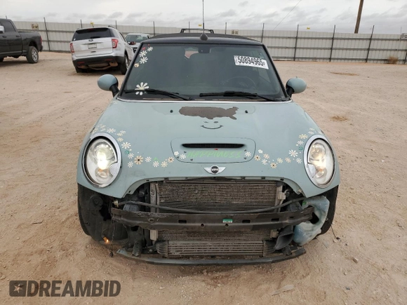 2014 MINI Convertible S with VIN WMWZP3C56ET707425, listed as a Copart auction lot 50894965 with 100,116 mi miles and Salvage Title. Bid and sale history available at DreamBid. Image 5.