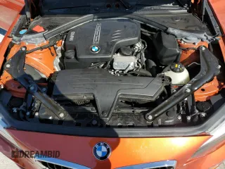 2016 BMW 2 Series 228i with VIN WBA1K9C50GV710942, listed as a Copart auction lot 77700934 with 28,643 mi miles and Salvage Title. Bid and sale history available at carsss.com. Image 11.