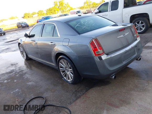 2011 Chrysler 300 with VIN 2C3CA6CTXBH580203, listed as a IAAI auction lot 41751968 with 173,916 mi miles. Bid and sale history available at carsss.com. Image 3.