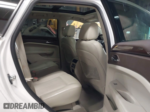 2011 Cadillac SRX Luxury Collection with VIN 3GYFNDEY1BS548452, listed as a IAAI auction lot 41476690 with 156,922 mi miles and . Bid and sale history available at carsss.com. Image 8.