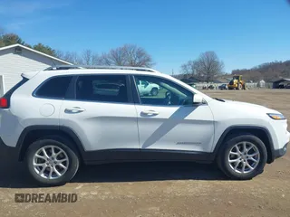 2015 Jeep Cherokee Latitude with VIN 1C4PJMCS8FW624375, listed as a IAAI auction lot 41848679 with 148,130 mi miles and . Bid and sale history available at DreamBid. Image 13.
