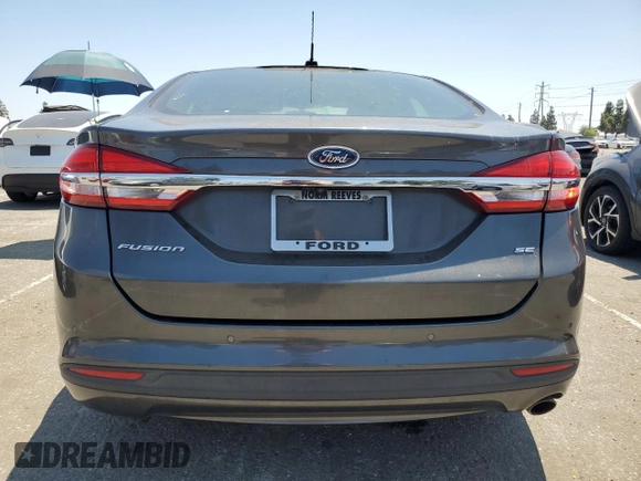 2017 Ford Fusion SE with VIN 3FA6P0H77HR247699, listed as a Copart auction lot 63482525 with 129,736 mi miles and Clean title. Bid and sale history available at DreamBid. Image 6.