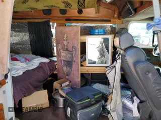 1994 GMC Vandura z VIN 1GDEG25KXRF519134, wystawiony jako Copart lot #75056124 z przebiegiem 245 597 mil mil oraz Szkody całkowita. Historia ofert i sprzedaży dostępna na DreamBid. Obrazek 11.