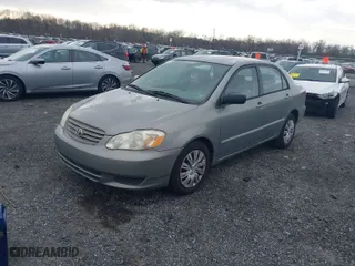 2004 Toyota Corolla CE with VIN 2T1BR32E24C309957, listed as a IAAI auction lot 41894304 with 299,999 mi miles. Bid and sale history available at carsss.com. Image 2.