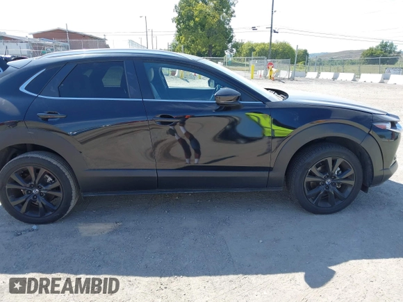 2022 Mazda CX-30 2.5 Turbo with VIN 3MVDMBAY4NM452705, listed as a IAAI auction lot 40101452 with 18,873 mi miles and . Bid and sale history available at DreamBid. Image 13.