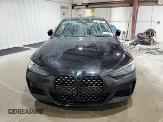 2021 BMW 4 Series M440i xDrive with VIN WBA13AR0XMCG68638, listed as a Copart auction lot 52142695 with 57,299 mi miles and Salvage Title. Bid and sale history available at DreamBid. Image 5.
