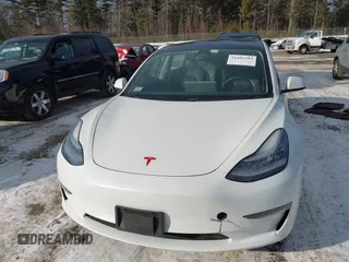 2020 Tesla Model 3 Standard Range Plus with VIN 5YJ3E1EA7LF742973, listed as a IAAI auction lot 41409285 with 48,993 mi miles and . Bid and sale history available at DreamBid. Image 6.