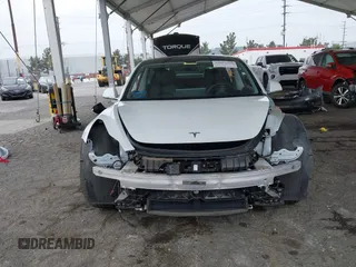 2020 Tesla Model 3 Long Range with VIN 5YJ3E1EB5LF801530, listed as a IAAI auction lot 41682050 with 65,743 mi miles. Bid and sale history available at carsss.com. Image 6.
