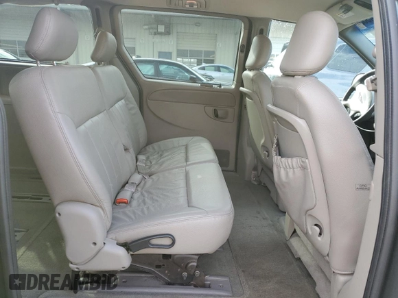 2002 Chrysler Town & Country LXi with VIN 2C8GP54L32R676672, listed as a Copart auction lot 44120565 with 57,090 mi miles and Salvage Title. Bid and sale history available at carsss.com. Image 11.