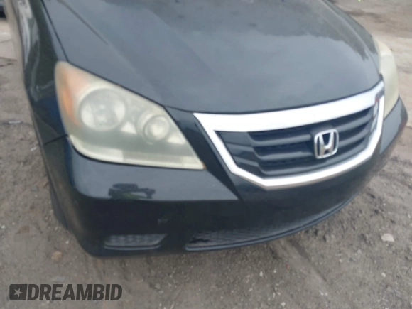 2008 Honda Odyssey EX-L with VIN 5FNRL38758B114588, listed as a IAAI auction lot 42101377 with 306,345 mi miles and . Bid and sale history available at DreamBid. Image 6.