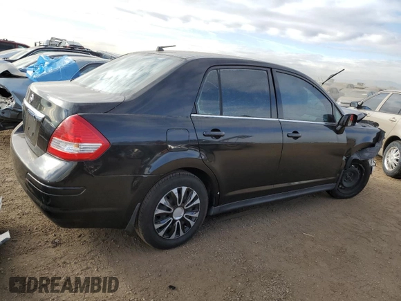 2009 Nissan Versa 1.8 S with VIN 3N1BC11E19L382395, listed as a Copart auction lot 41666375 with 153,899 mi miles and Salvage Title. Bid and sale history available at carsss.com. Image 3.