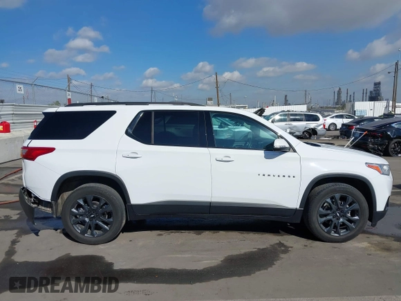 2021 Chevrolet Traverse RS z VIN 1GNEVJKW0MJ266088, wystawiony jako IAAI lot #41504928 z przebiegiem 57 966 mil mil oraz . Historia ofert i sprzedaży dostępna na DreamBid. Obrazek 13.