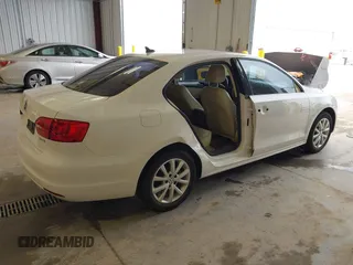 2013 Volkswagen Jetta SE with VIN 3VWDP7AJ0DM439860, listed as a IAAI auction lot 42145085 with 96,247 mi miles and . Bid and sale history available at DreamBid. Image 4.
