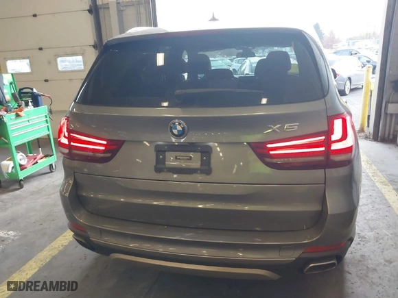 2018 BMW X5 xDrive40e iPerformance with VIN 5UXKT0C59J0V98760, listed as a IAAI auction lot 40983738 with 126,278 mi miles. Bid and sale history available at carsss.com. Image 16.