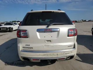 2014 GMC Acadia Denali z VIN 1GKKVTKD2EJ358735, wystawiony jako Copart lot #52299545 z przebiegiem 192 817 mil mil oraz Czysty tytuł • Clean title. Historia ofert i sprzedaży dostępna na DreamBid. Obrazek 6.
